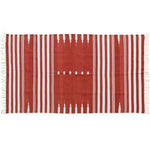 This vibrant red natural vegetable dyed Indian Dhurrie rug is perfect for adding a touch of boho charm to your living room or office. The reversible cotton rug features bold white stripes and intricate patterns, making it a versatile choice among area rugs. Ideal for those seeking cotton rugs that blend style and tradition.