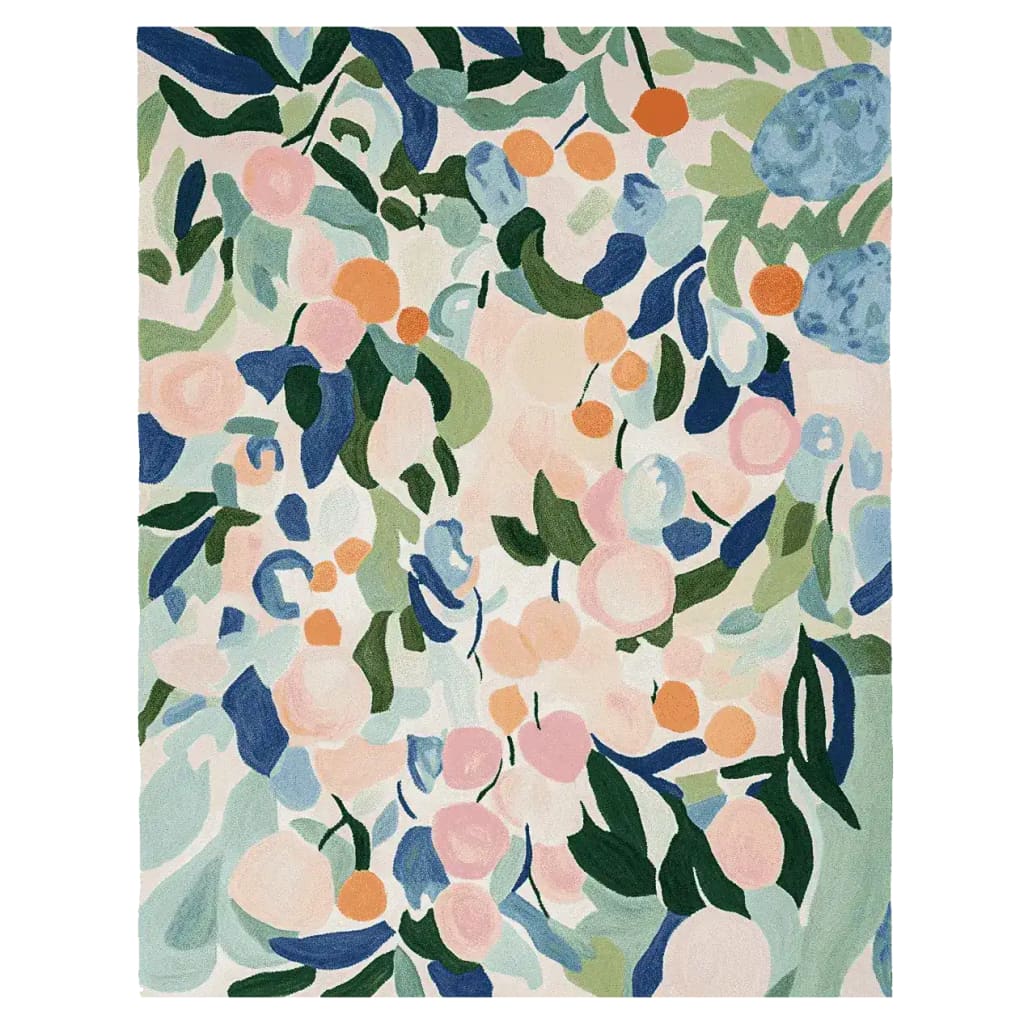 Floral patterned rug with colorful flowers and leaves on a light background