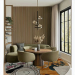 A beautifully decorated bedroom featuring a Nature's Kaleidoscope Hand Tufted Round Rug. This stunning floral rug adds a splash of color with its intricate design, perfectly complementing the modern decor. Made from high-quality wool, this large area rug provides a cozy and stylish touch, ideal for enhancing any bedroom space.