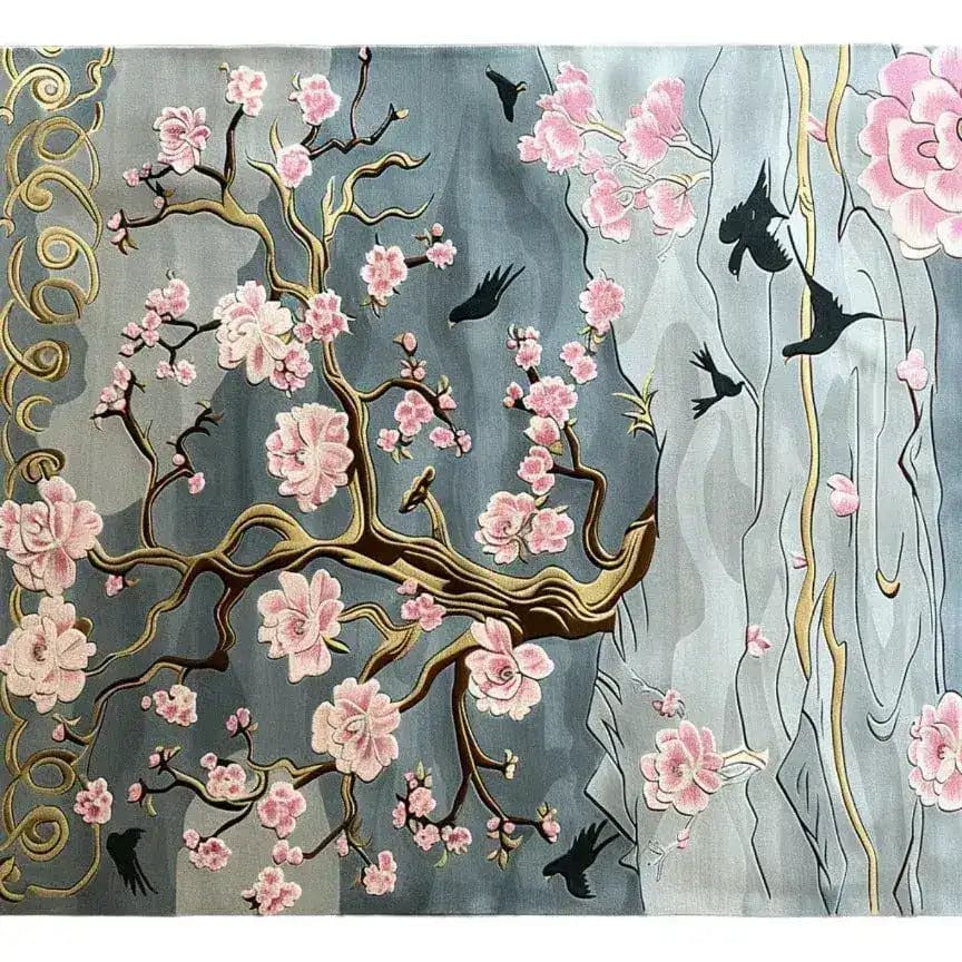 Nature's Serenade Hand Tufted Rug showcasing a beautiful floral design with delicate pink blossoms and graceful birds on a soft grey background. This wool area rug is perfect for adding elegance to your dining room or living room, making it a standout piece in home decor.