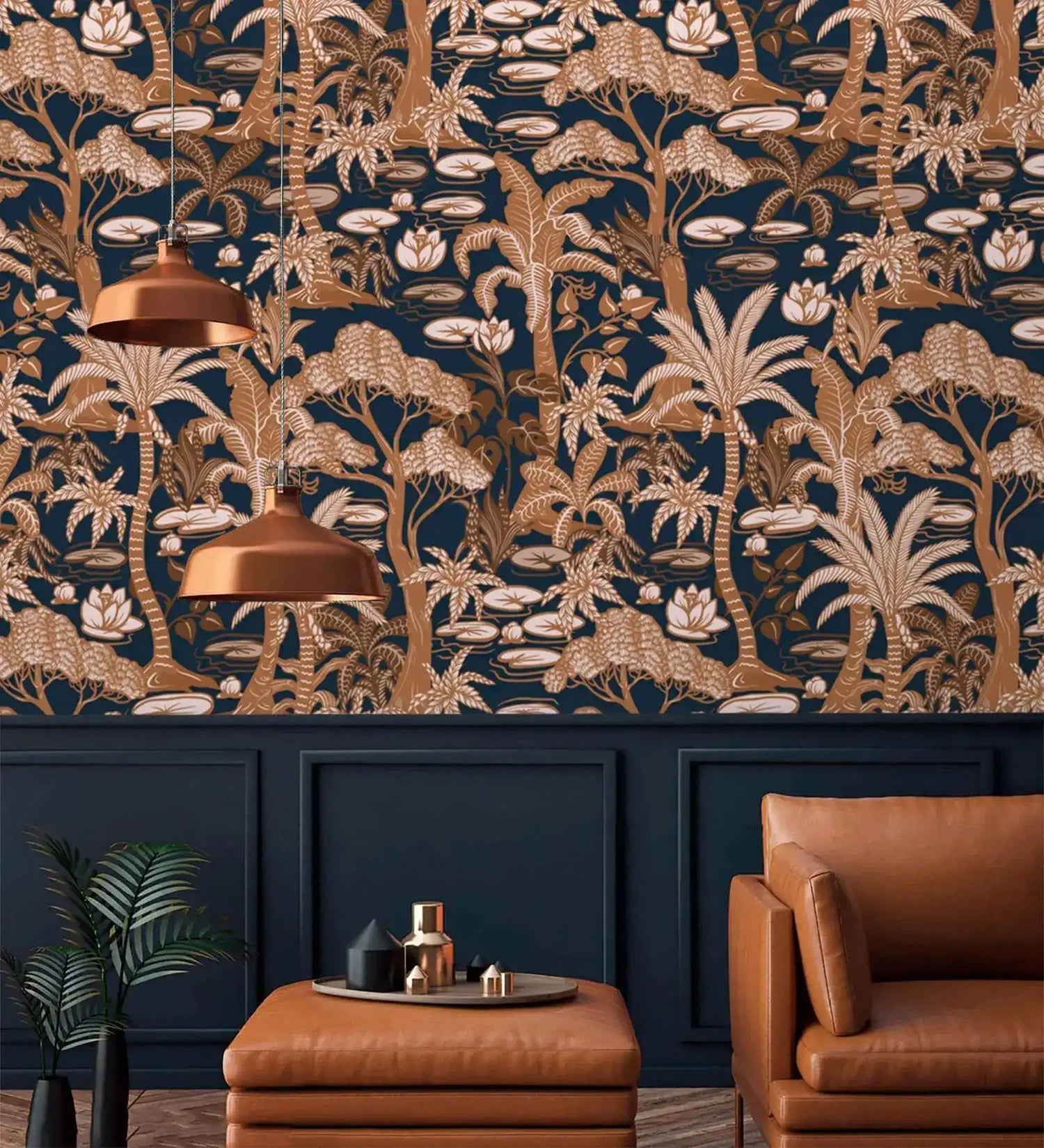 Navy and copper palm tree wallpaper in a sophisticated lounge with tan leather sofa and pendant lamps