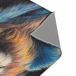 Corner fold of dark navy botanical print with orange ginkgo flower and grey non-slip backing, Neon King Vibrant Lion Accent Rug