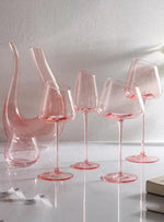 The Nordic Flamingo Pink Wine Glass is a stylish and elegant piece designed to elevate any dining or drinking experience. It features a unique, vibrant pink color that adds a touch of sophistication and modernity. The glass is crafted with a delicate yet durable design, combining smooth curves and a refined stem for a comfortable grip. Its Nordic-inspired aesthetics bring a minimalist, contemporary charm, making it perfect for both casual and formal occasions. Whether you're enjoying a glass of wine, champa