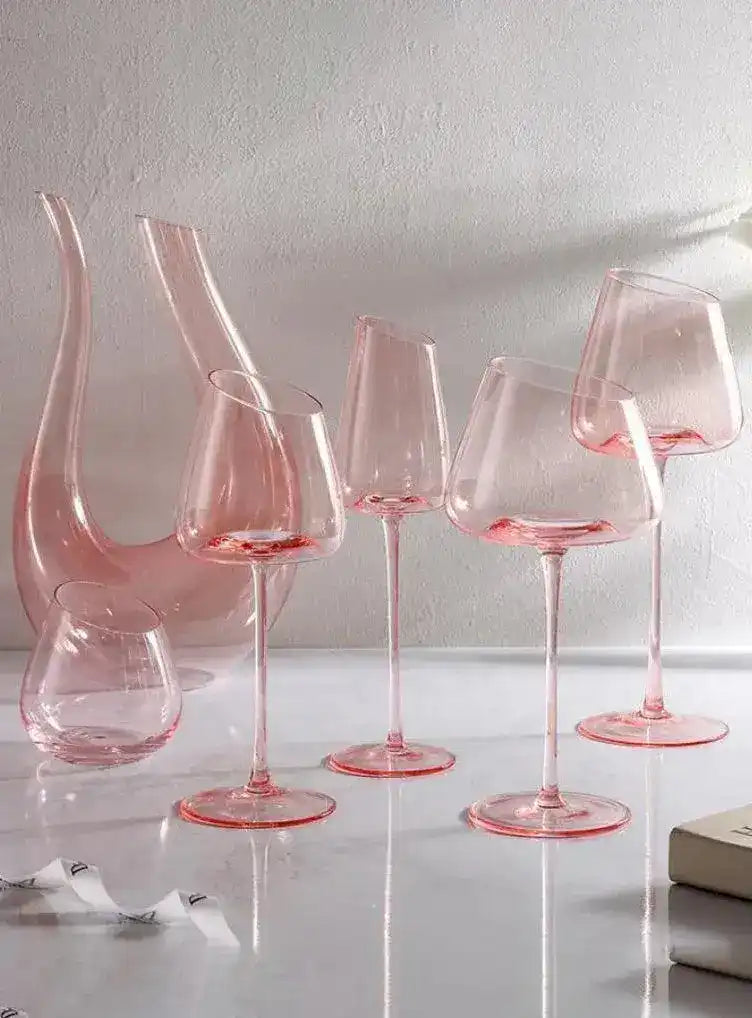 The Nordic Flamingo Pink Wine Glass is a stylish and elegant piece designed to elevate any dining or drinking experience. It features a unique, vibrant pink color that adds a touch of sophistication and modernity. The glass is crafted with a delicate yet durable design, combining smooth curves and a refined stem for a comfortable grip. Its Nordic-inspired aesthetics bring a minimalist, contemporary charm, making it perfect for both casual and formal occasions. Whether you're enjoying a glass of wine, champa