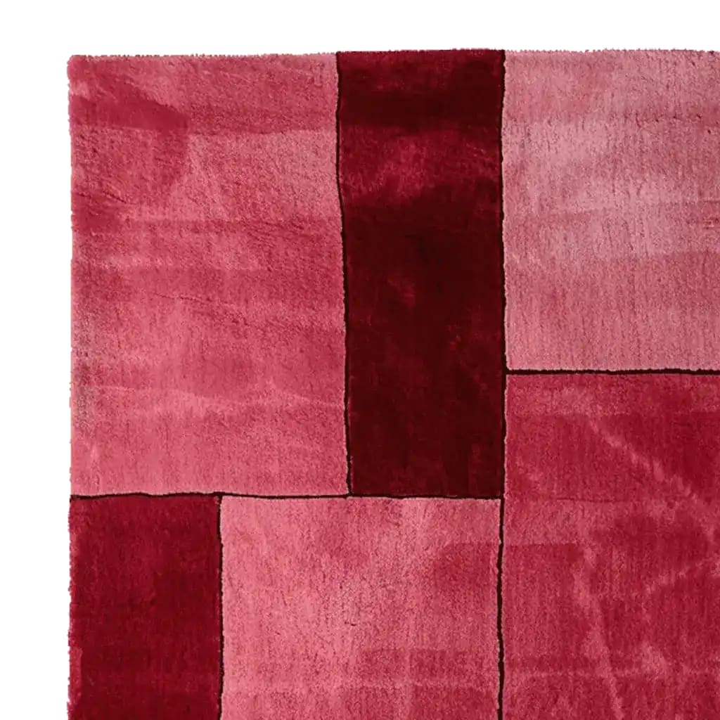 Top view of the Obscura Red Panel Hand Tufted Area Rug, showcasing its bold geometric design in shades of red. This contemporary wool rug adds a vibrant touch to any living room, offering a modern aesthetic that's perfect for contemporary decor.