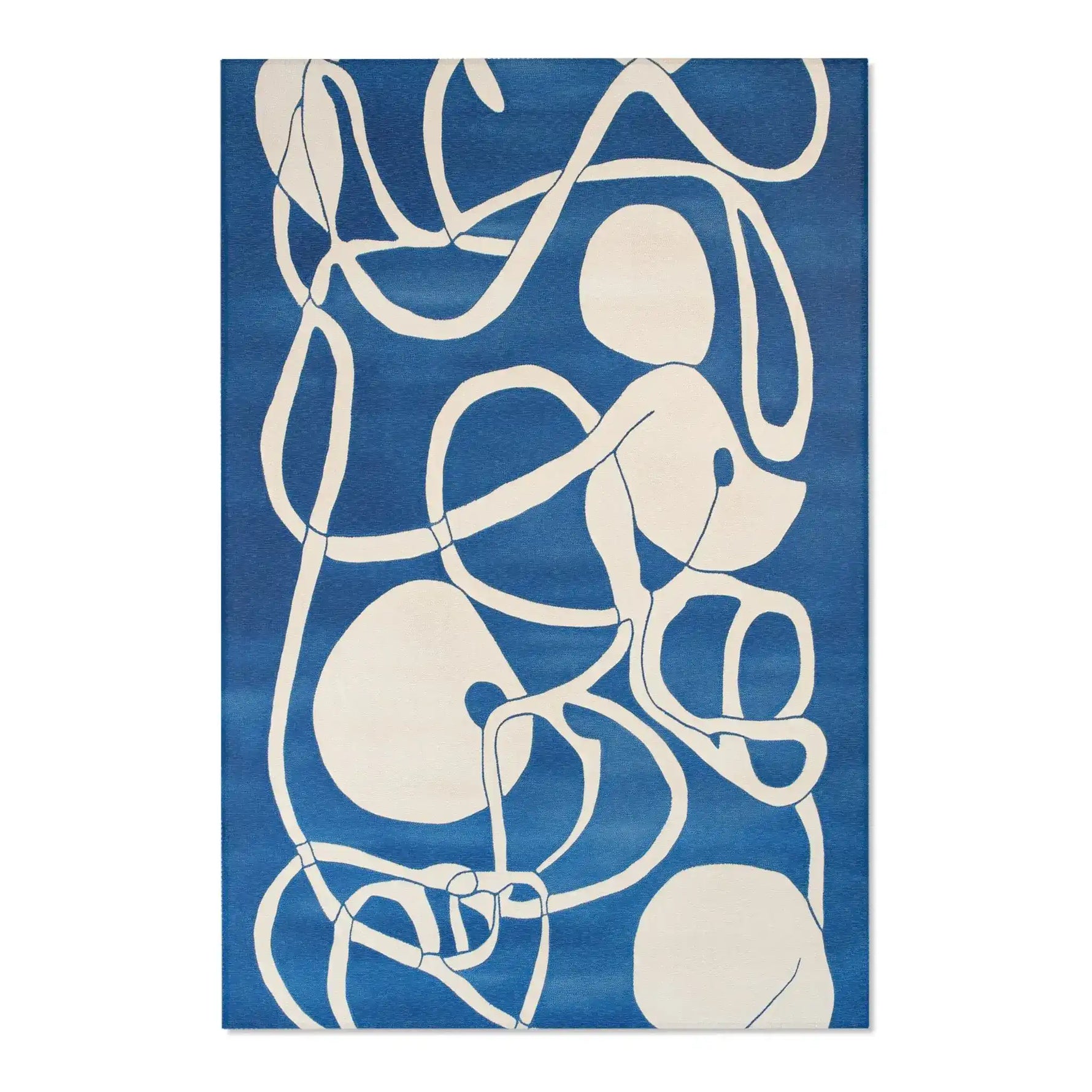 Ocean Flow rug hung on clothesline showing crocodile in gold-embroidered blue coat with red sunglasses, full vertical drape