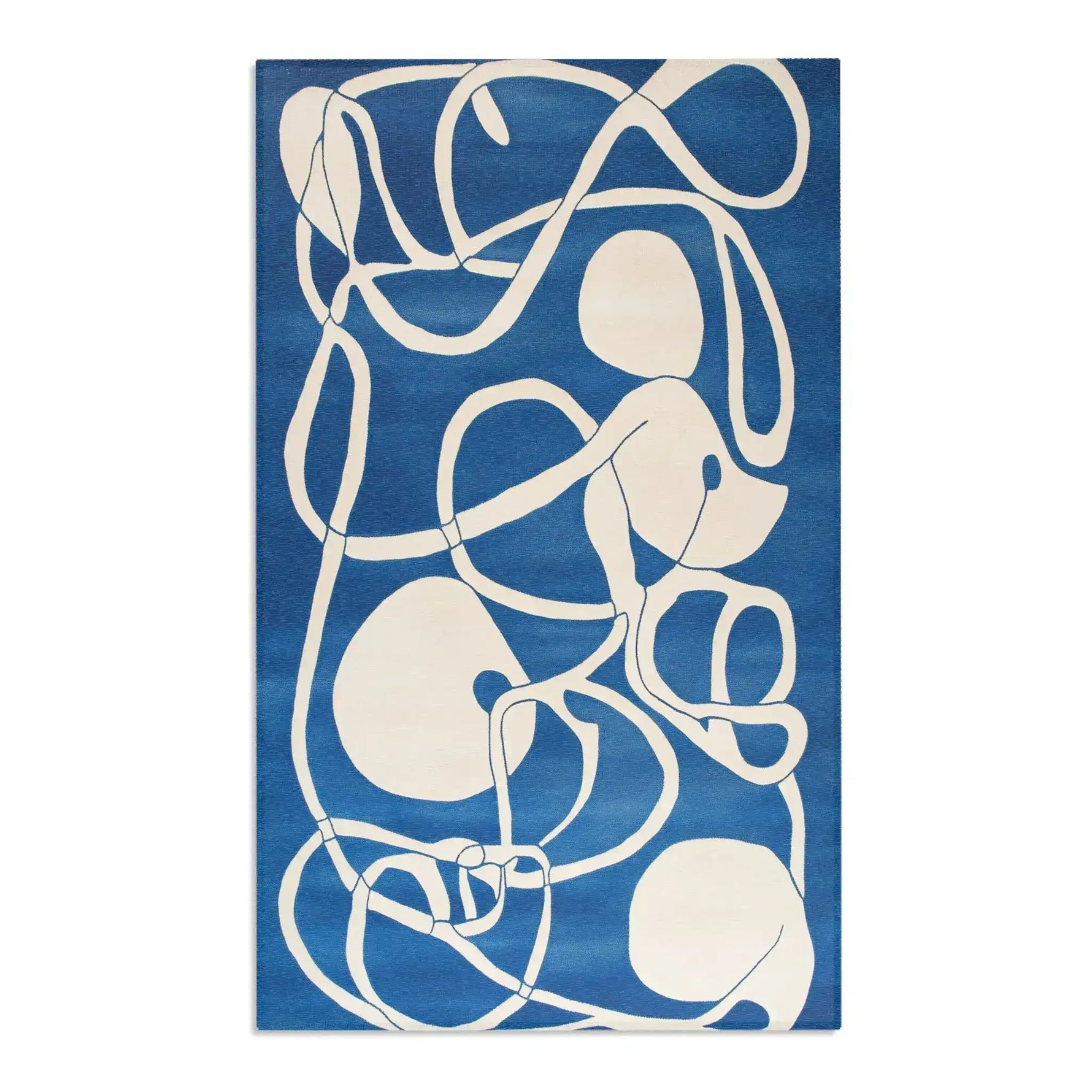 Ocean Flow Abstract Blue and White Rug in cobalt blue with fluid white flowing lines and oval forms, size variant view