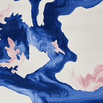 The Ocean Vein Hand Tufted Rug is a captivating area rug featuring a swirling abstract design in deep blue and soft pink hues against a cream background. This contemporary wool rug offers a modern touch, perfect for enhancing living room spaces. Ideal for those seeking stylish area rugs for living rooms.