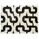Top view of the Oceanic Whispers Hand Tufted Wool Rug, featuring a bold black and white geometric pattern. This contemporary rug is perfect for adding a modern touch to living room area rugs, combining style and comfort in a high-quality wool rug.