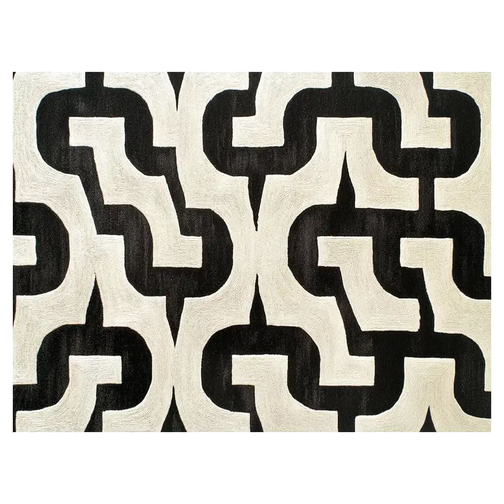 Top view of the Oceanic Whispers Hand Tufted Wool Rug, featuring a bold black and white geometric pattern. This contemporary rug is perfect for adding a modern touch to living room area rugs, combining style and comfort in a high-quality wool rug.
