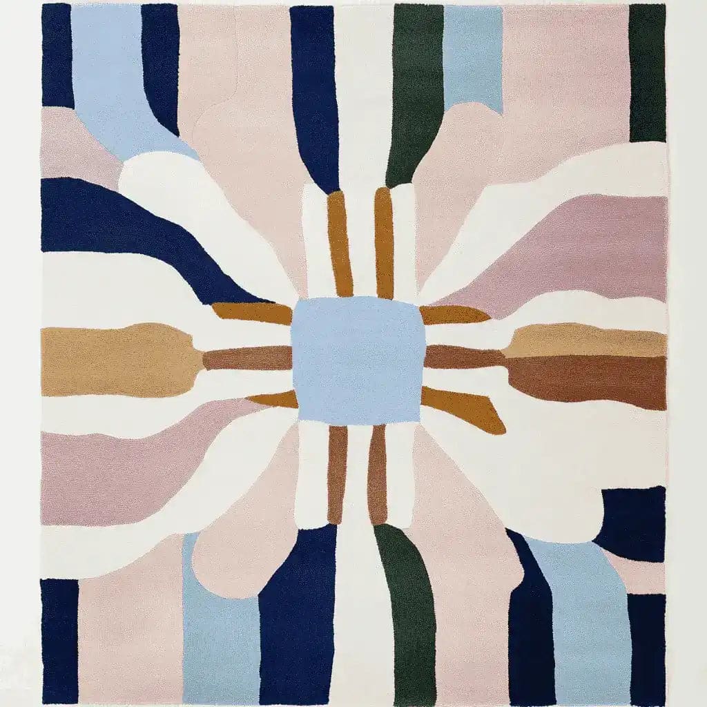 Top view of a vibrant Offset Canvas Fragment Hand Tufted Rug showcasing an abstract design with bold blue, pink, green, and mustard tones. This contemporary wool area rug is perfect for adding a modern touch to your living room decor.