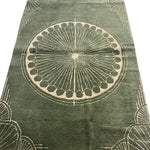 Olive Green Moon Art Deco hand-tufted wool area rug featuring a circular geometric pattern in the center, perfect for adding a touch of elegance to living rooms or offices.