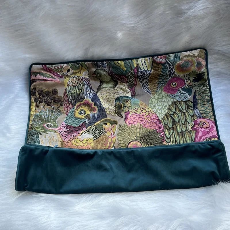 Opulent jungle aviary throw pillow cover featuring vibrant bird patterns in a colorful design, perfect for adding a touch of nature-inspired decor to any space.
