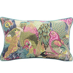 Colorful throw pillow featuring a vibrant jungle aviary design with various parrot illustrations.
