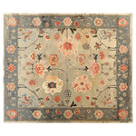 A beautifully crafted Opulent Legacy Hand Tufted Wool Rug featuring an intricate floral design in warm tones, perfect for enhancing any living space. This large living room area rug showcases a blend of traditional and modern aesthetics, ideal for those seeking elegance and comfort in a wool rug.