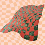 A vibrant orange and green wavy checker pattern hand-tufted wool area rug, perfect for adding a bold statement to your living room or hallway. This large area rug combines a vintage charm with modern design, suitable as a living room rug 8x10 or a hallway runner rug. Made from high-quality wool, it's also ideal as a kitchen runner rug or a bathroom runner rug, providing a stylish and cozy touch to any space.