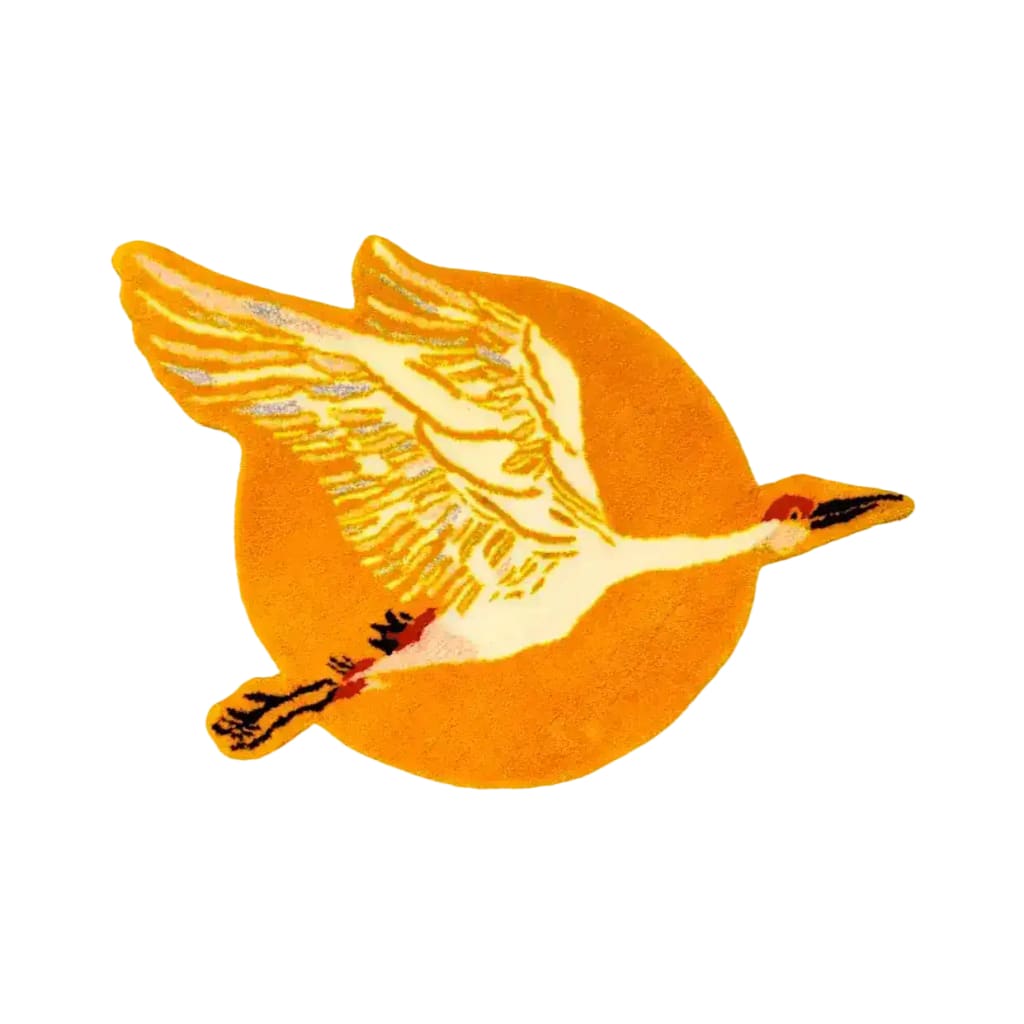 A vibrant, round wool rug featuring an elegant crane in flight over a radiant orange sun, perfect for large living rooms. This Chinoiserie style area rug adds a unique artistic touch to any living space, blending bold colors with soft textures.