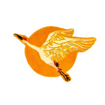 A vibrant orange Chinoiserie crane design over a sun motif on a hand-tufted wool area rug. Ideal for adding a touch of elegance to living room and dining room spaces, this round rug features intricate details perfect for enhancing your home's decor.