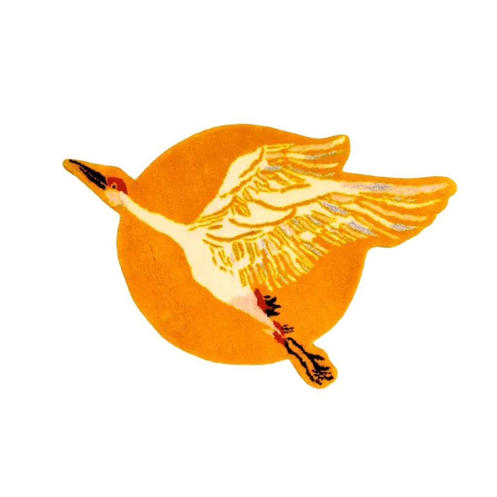 A vibrant orange Chinoiserie crane design over a sun motif on a hand-tufted wool area rug. Ideal for adding a touch of elegance to living room and dining room spaces, this round rug features intricate details perfect for enhancing your home's decor.
