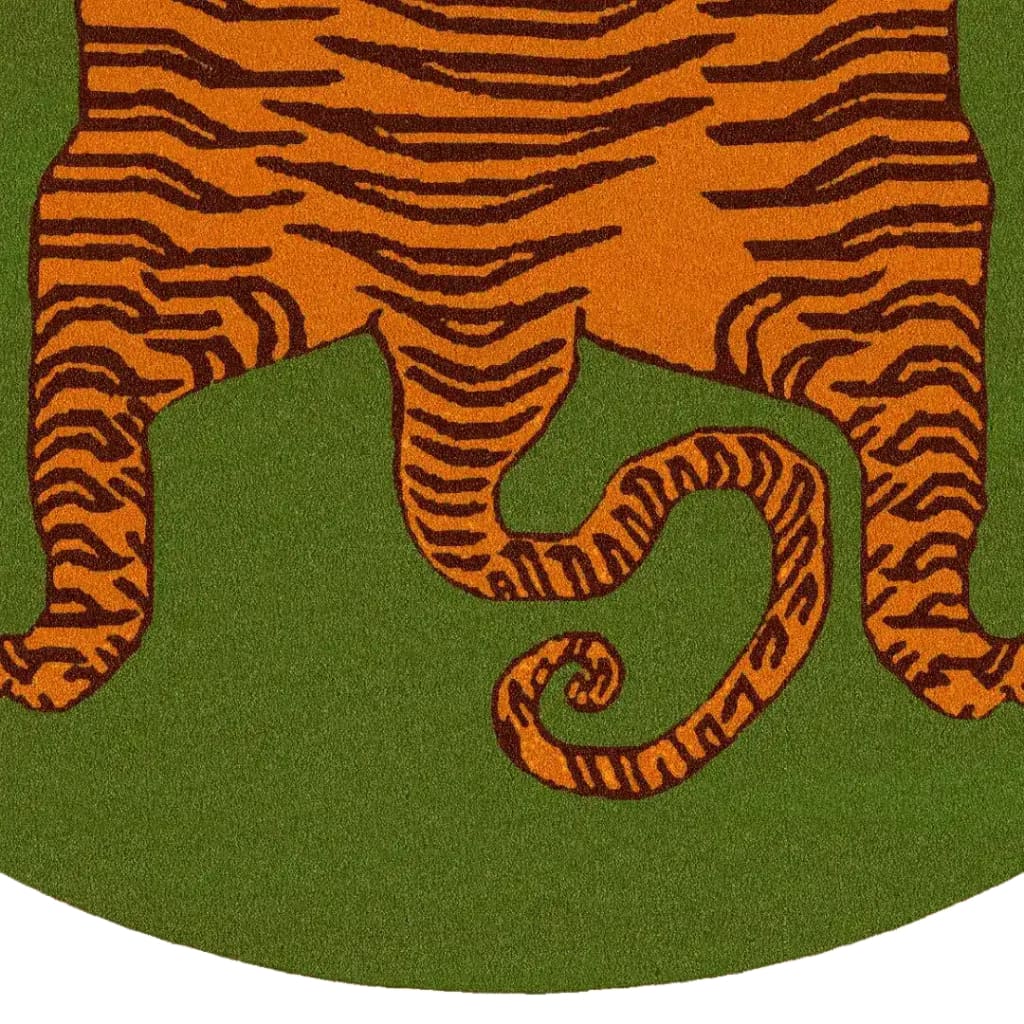 Close-up view of an Orange Tibetan Tiger Green Hand Tufted Round Rug, showcasing vibrant tiger stripes on a green background. This wool rug is a perfect large area rug for an office or living room, adding a bold and exotic touch to any space.