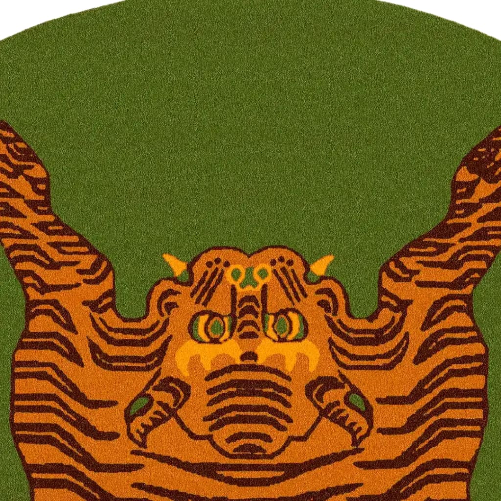 Top view of an Orange Tibetan Tiger Green Hand Tufted Round Rug, showcasing a striking tiger design on a lush green background. This large wool area rug is perfect for adding a bold touch to any office or living room.