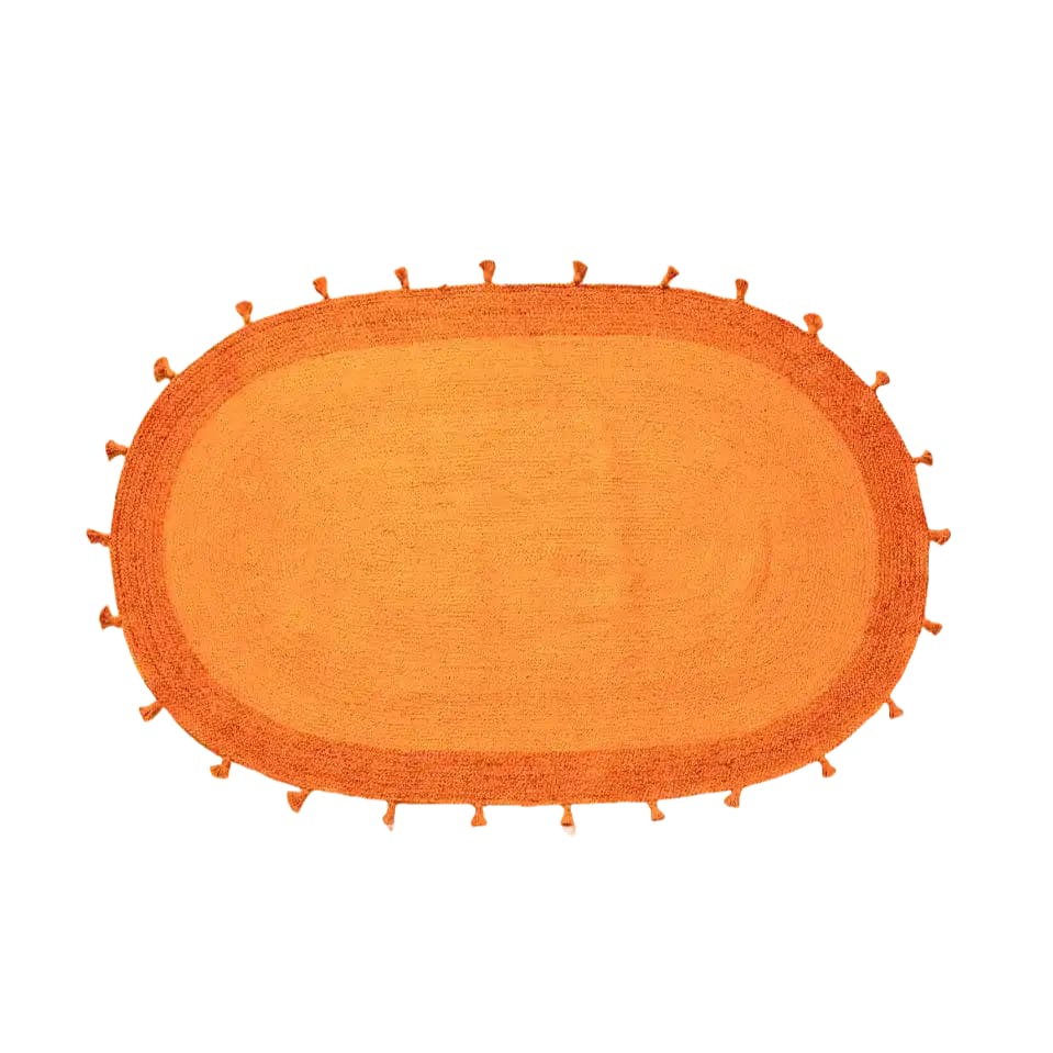 This vibrant Orange Two Toned Oval Jute Rug with Tassels is a perfect large area rug for a boho-themed bedroom. The rug features a warm, inviting orange hue with intricate woven details, making it an ideal choice for those seeking stylish rugs for the bedroom.
