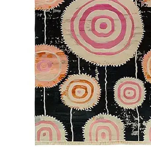 Colorful Orbit Bloom Hand Tufted Area Rug with abstract circular patterns in vibrant pink and orange tones, perfect for adding a vintage touch to your living room or dining room. This wool rug is available in an 8x10 size, ideal for enhancing any space with its bold design.