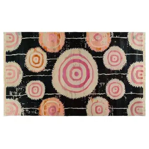 Vibrant Orbit Bloom Hand Tufted Area Rug in a striking abstract design with concentric circles in pink and orange hues on a dark background, perfect for adding a vintage touch to your living room or dining room. This 8x10 wool rug blends modern artistry with a cozy feel, making it an ideal choice for living room and dining room rugs.