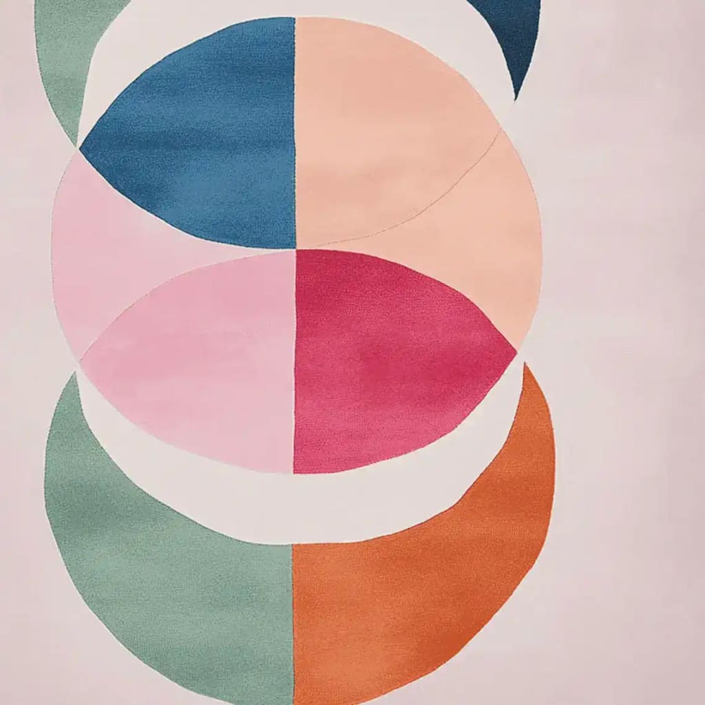 Vibrant Orbit Petal Prism hand-tufted area rug showcasing a modern, abstract design with colorful geometric shapes. This contemporary wool rug adds a splash of color to any living room, perfect for those seeking large living room rugs with a unique style.