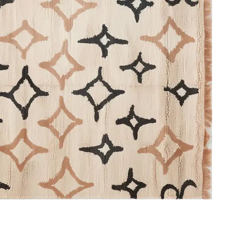 A contemporary wool rug featuring an abstract geometric pattern in black and beige tones. This area rug, ideal for living rooms, adds a stylish touch to any space. Perfect for those seeking an 8x10 size rug that combines elegance with modern design.