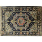 Top view of the Orchid Opulence Hand Knotted Area Rug showcasing an intricate vintage design with rich colors. This large living room rug features a detailed Persian rug pattern, perfect for adding elegance to any space.