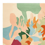 This vibrant area rug features a contemporary abstract design with a mix of pastel and bold colors, ideal for modern living rooms. Hand tufted with organic materials, this wool rug offers a plush texture perfect for an 8x10 space, adding a touch of artistic flair to any living room.