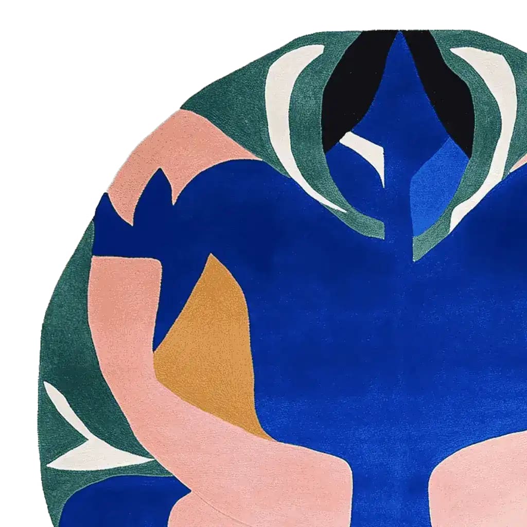 A vibrant and contemporary hand-tufted round area rug featuring an abstract design in blue, pink, green, and white colors. Perfect for adding a modern touch to any living room, this wool rug combines artistic flair with functionality, making it an ideal choice for those seeking stylish area rugs for living room spaces.