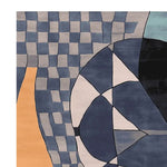 An abstract design on a hand tufted wool rug, featuring a mix of geometric patterns and soothing blue, black, and beige tones. This contemporary area rug is perfect for adding a modern touch to large living room spaces.