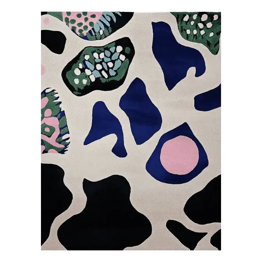 Organic Pattern Play Hand Tufted Rug showcasing an abstract design with bold colors including blue, pink, and green. This area rug is perfect for a contemporary living room, made from high-quality wool, offering a modern touch to large living spaces.