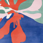 Top view of an Organic Shape Vibe Hand Tufted Rug featuring an abstract design with vibrant colors like red, blue, green, and pink. This contemporary wool area rug is perfect for large living rooms, adding a modern touch with its unique pattern. Ideal as a square area rug or living room area rug.