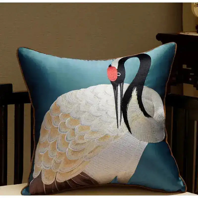 Oriental crane embroidered satin throw pillow cover featuring intricate detailing on a blue background, perfect for home decor.