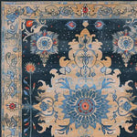 Discover the Ornate Blooms Hand Tufted Rug, a stunning area rug perfect for your dining room or living room. This floral rug features intricate vintage patterns in vibrant blues and earthy tones, made from high-quality wool. Ideal for enhancing the elegance of dining table settings and adding warmth to any space.