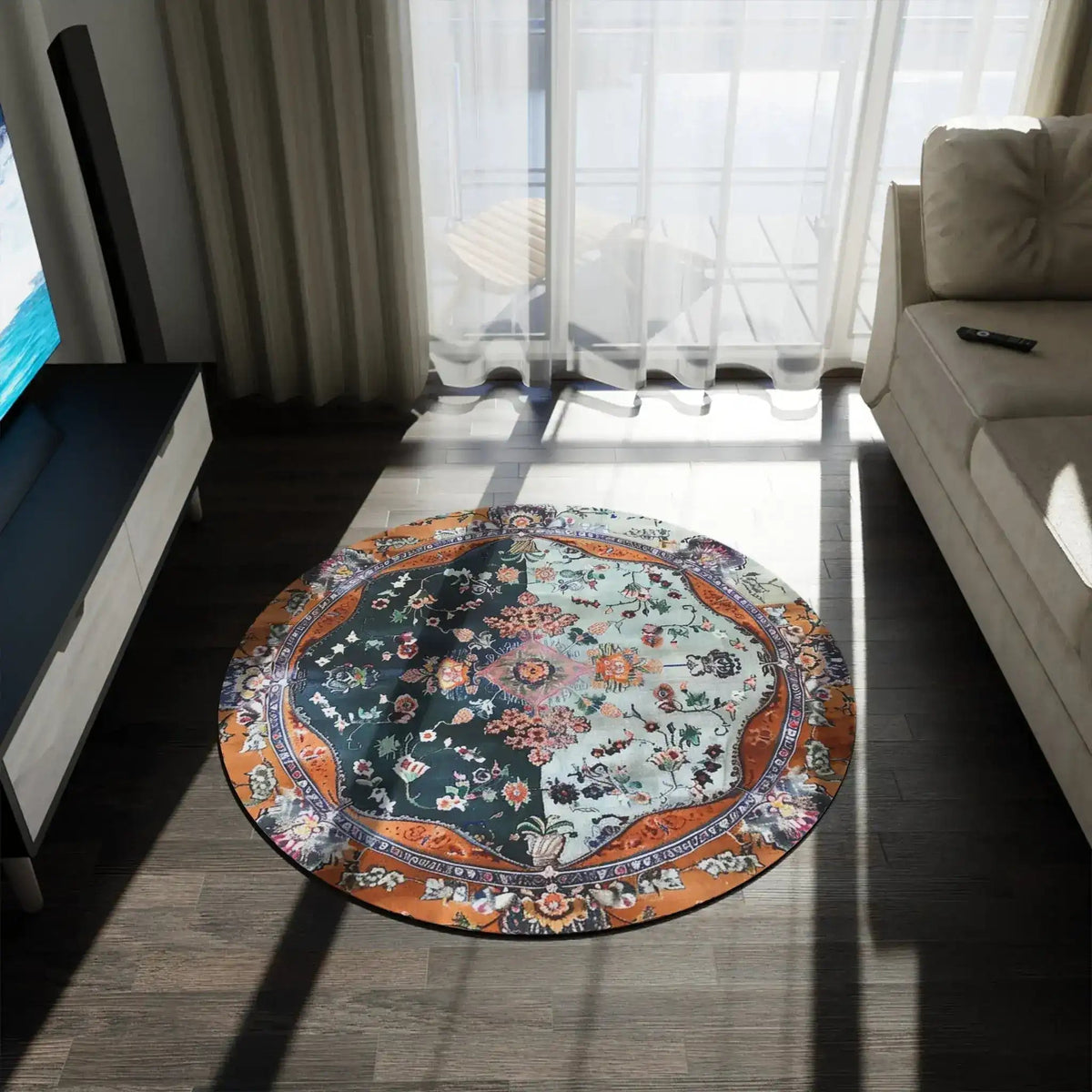 Ornate Floral and Geometric round rug in dark living room near TV and sofa, teal and orange medallion pattern on floor