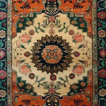 A beautifully ornate floral crest hand knotted area rug featuring intricate patterns and vibrant colors. This vintage rug, ideal for large living rooms, showcases traditional Persian rug designs, enhancing any space with its timeless elegance.