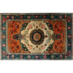 A beautifully ornate floral crest hand-knotted area rug showcasing a vibrant vintage design. This Persian rug features an intricate central medallion surrounded by rich, colorful patterns, making it an ideal choice for large living room spaces.