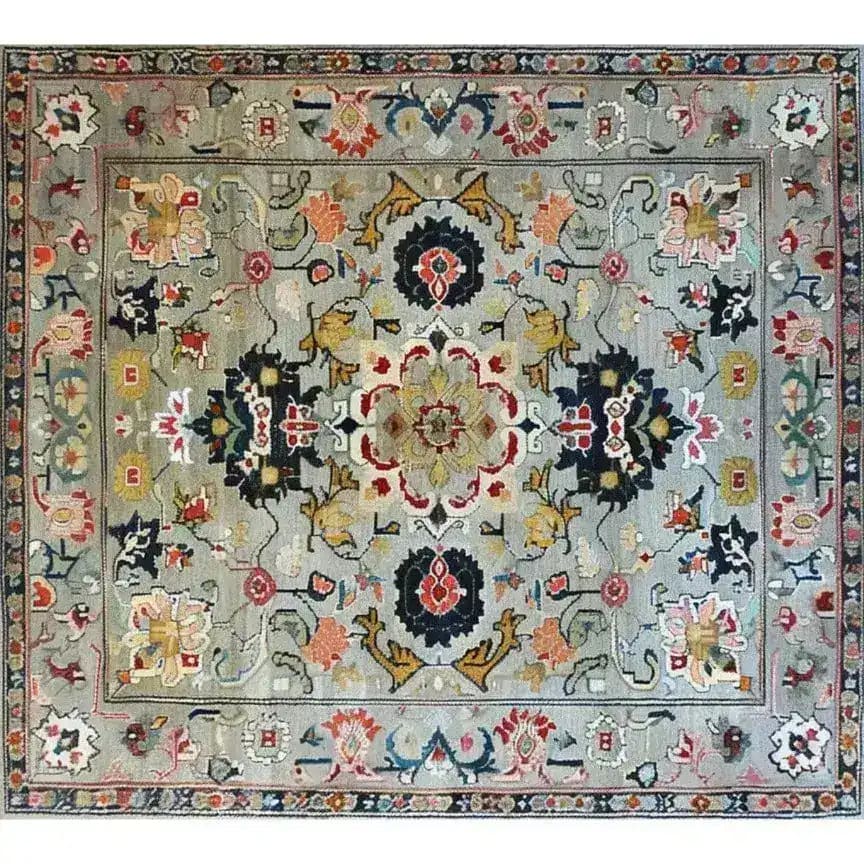 This ornate floral wool area rug showcases a harmonious blend of vintage and Persian-inspired designs, perfect for dining rooms or bedrooms. The hand-knotted viscose and wool create a luxurious feel, making it an ideal choice for a formal dining room or as a centerpiece in rugs for bedrooms.