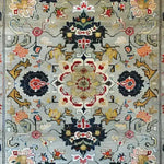 This image showcases an Ornate Floral Harmony Hard Viscose Hand Knotted Wool Rug, perfect for adding a touch of elegance to your dining room or bedroom. The vintage rug features intricate Persian-inspired designs in vibrant colors, making it an ideal choice for formal dining room rugs or as an exquisite wool rug for the bedroom.