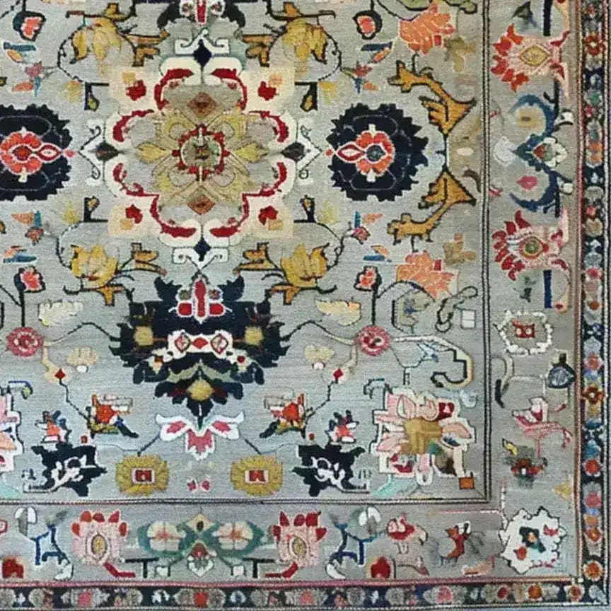 Intricately designed ornate floral harmony area rug, hand-knotted with viscose and wool, showcasing vibrant vintage patterns. Perfect for adding a touch of elegance to a dining room or bedroom. This Persian-style wool rug combines traditional motifs with modern flair, ideal for formal dining room settings or cozy bedroom retreats.