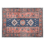 Ornate Mirage Hand Tufted Area Rug featuring a vintage design with intricate floral patterns in rich blue and soft pink hues. This wool rug provides an elegant touch to any living room space, perfectly sized for 8x10 settings.