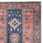 This image showcases the Ornate Mirage Hand Tufted Rug, a stunning area rug perfect for any living room. The rug features a vintage design with intricate floral patterns in rich blue and warm coral tones, crafted from high-quality wool. Ideal for an 8x10 space, this wool rug adds a touch of elegance and sophistication to any home decor.