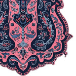 The Ornate Whispers Hand-Tufted Rug is an elegant area rug featuring a vintage design with intricate floral and abstract patterns in rich pink and navy colors. This wool rug is perfect for adding a touch of sophistication to your living room, ideally suited for an 8x10 space.