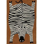 This image showcases an oversized zebra hand-tufted wool rug, ideal for adding a unique touch to your dining room or living room area. The rug features a playful zebra design with bold black and white stripes, perfect for those seeking distinctive living room area rugs or dining room area rugs.