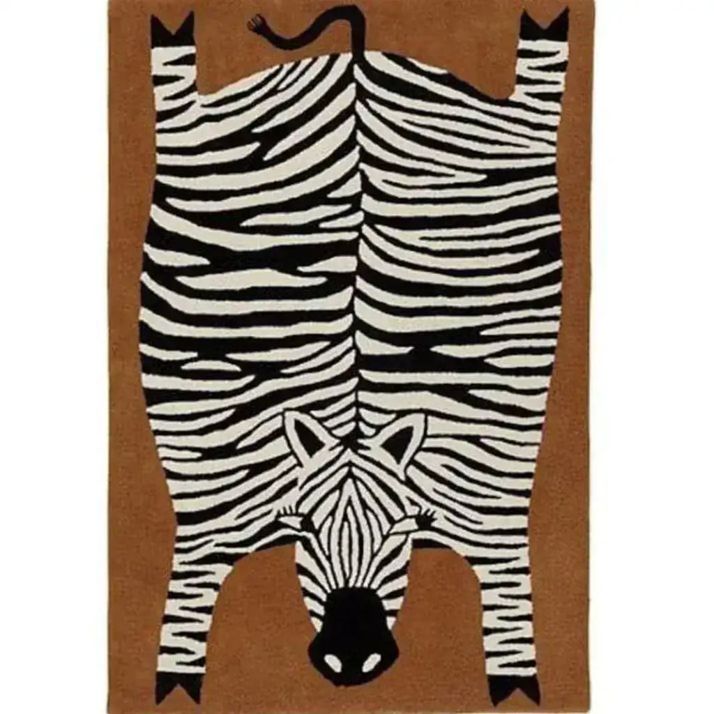 This image showcases an oversized zebra hand-tufted wool rug, ideal for adding a unique touch to your dining room or living room area. The rug features a playful zebra design with bold black and white stripes, perfect for those seeking distinctive living room area rugs or dining room area rugs.