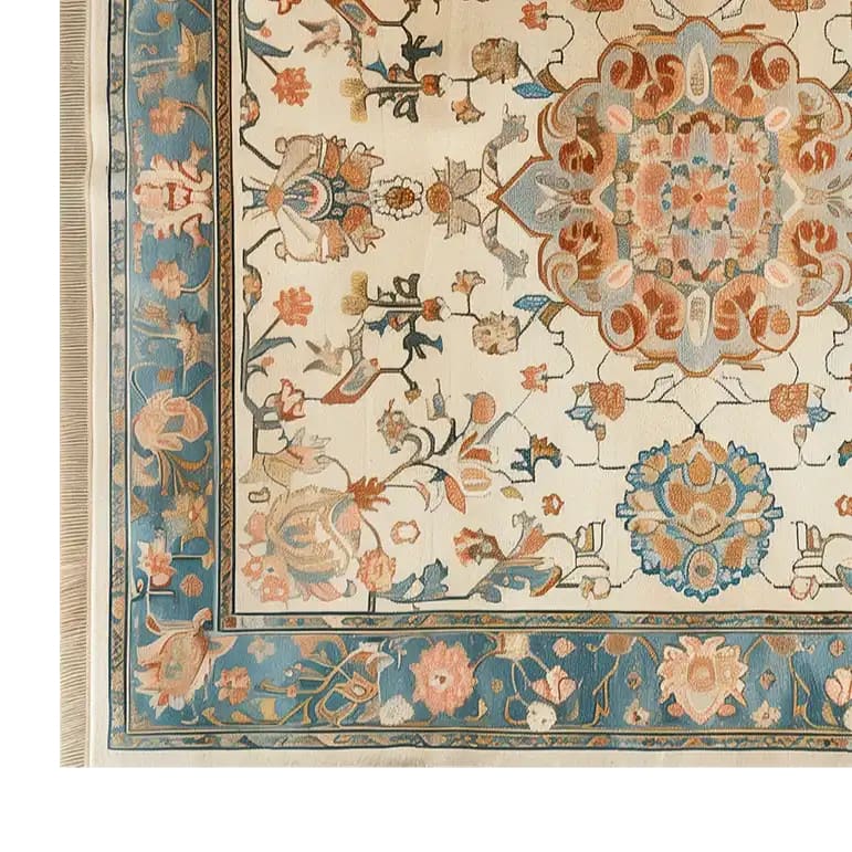 A beautifully detailed area rug showcasing intricate floral patterns in vibrant blues, oranges, and beiges. The Palace Blossoms Knotted Wool Rug features a classic design perfect for adding elegance to any living room. This 8x10 floral rug is ideal for those seeking stylish and sophisticated rugs for living room spaces.
